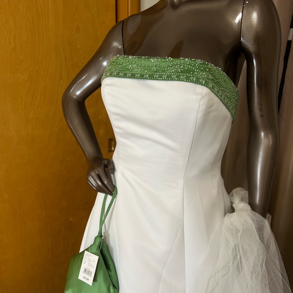 David,s Bridal style H9274 white with clover green beaded accents and train.